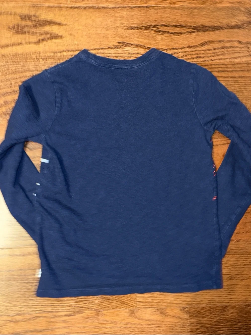 Size 8/M boys long sleeve t-shirt with Star Wars print.